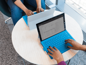 Person uses a Microsoft Surface device.