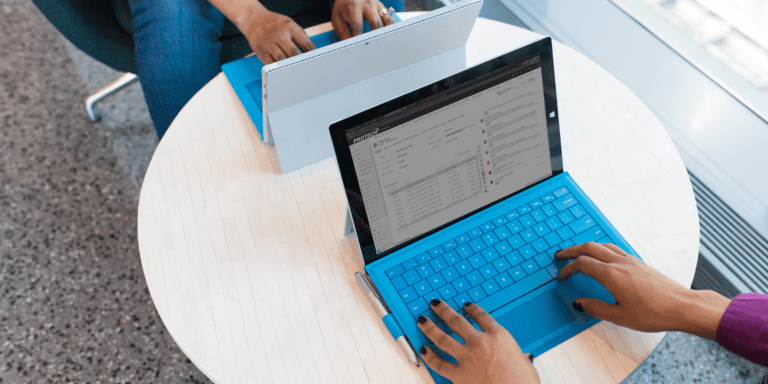 Person uses a Microsoft Surface device.